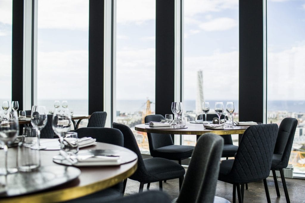 tables-and-chairs-arranged-in-skybar-restaurant-TUV65JD